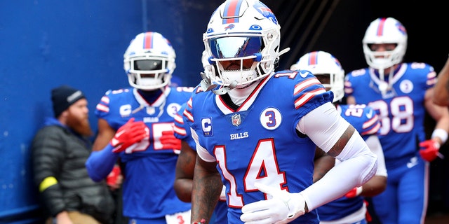 Stefon Diggs #14 of the Buffalo Bills runs onto the field before a game against the New England Patriots at Highmark Stadium on January 8, 2023 in Orchard Park, New York.