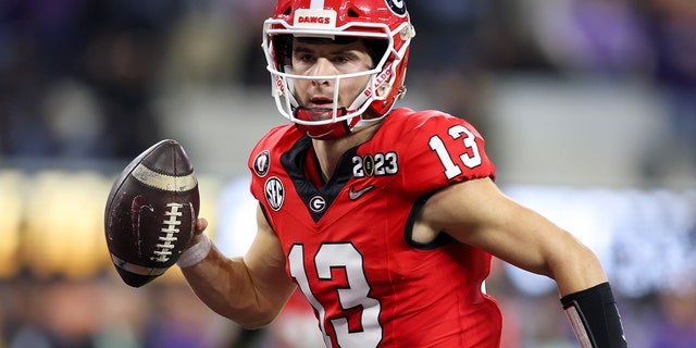 Georgia Bulldogs quarterback Stetson Bennett runs the ball for a touchdown against the TCU Horned Frogs on January 9, 2023 at SoFi Stadium in Inglewood, California.