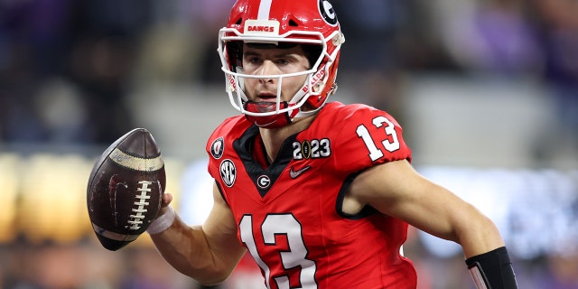 Georgia Bulldogs quarterback Stetson Bennett runs the ball for a touchdown against the TCU Horned Frogs on January 9, 2023 at SoFi Stadium in Inglewood, California.