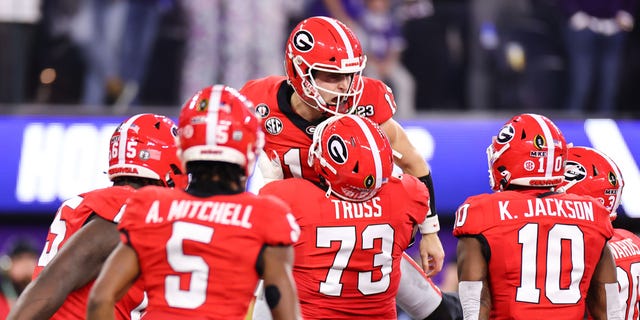 Stetson Bennett #13 of the Georgia Bulldogs celebrates a touchdown against the TCU Horned Frogs in the first half of the College Football Playoff National Championship held at SoFi Stadium on January 9, 2023 in Inglewood, California.