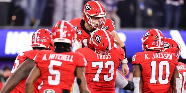 Stetson Bennett #13 of the Georgia Bulldogs celebrates a touchdown against the TCU Horned Frogs in the first half of the College Football Playoff National Championship held at SoFi Stadium on January 9, 2023 in Inglewood, California.