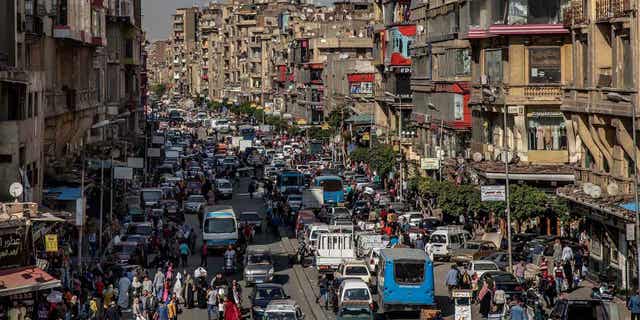 A crowded street is shown above in Cairo, Egypt, on April 14, 2020. Egypt continues to battle inflation amid a dramatic slide in its currency, according to the country's statistics bureau on Jan. 10, 2023. 