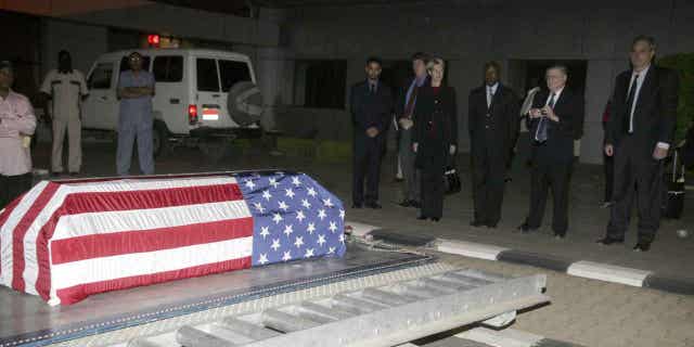 The coffin of John Granville, 33, who worked for the U.S. Agency for International Development, is received by U.S. officials in Khartoum, Sudan, on Jan. 3, 2008. Sudanese authorities have released a man convicted of the 2008 killing of John Granville.