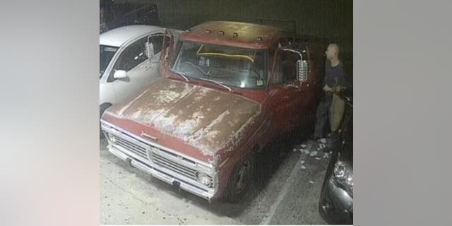 Houston police released a picture of the armed customers truck described as a "1970s or ’80s model pickup truck with no bed."