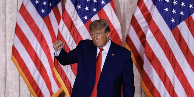 Former President Donald Trump gestures after speaking at the Mar-a-Lago Club in Palm Beach, Florida, on Tuesday, Nov. 15, 2022. 