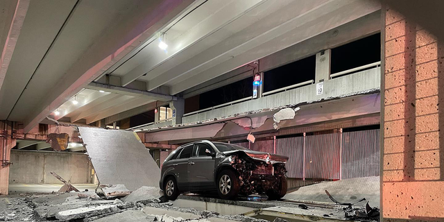 A vehicle that crashed into a wall of a parking garage at TidalHealth Peninsula Regional Hospital in Salisbury, Maryland caused part of the employee garage to collapse on Sunday morning.
