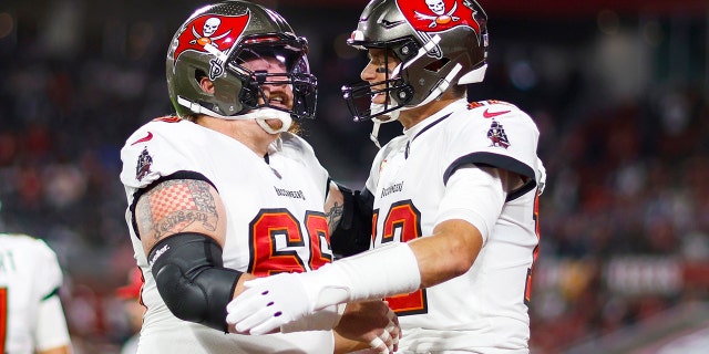 Tom Brady happy to have key offensive lineman back ahead of playoff game: 'It's a big boost for us' 2 Ryan Jensen #66 and Tom Brady #12 of the Tampa Bay Buccaneers embrace on the field prior to a game against the Dallas Cowboys in the NFC Wild Card playoff game at Raymond James Stadium on January 16, 2023 in Tampa, Florida.