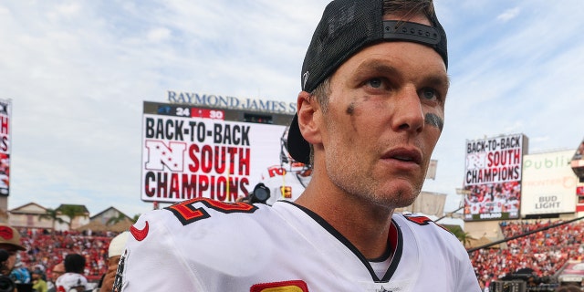 Jan 1, 2023; Tampa, Florida, USA; Tampa Bay Buccaneers quarterback Tom Brady (12) looks on after beating the Carolina Panthers to clinch the NFC south division at Raymond James Stadium.