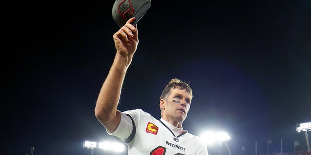 Tom Brady #12 of the Tampa Bay Buccaneers walks off the field after losing to the Dallas Cowboys 31-14 in the NFC Wild Card playoff game at Raymond James Stadium on January 16, 2023 in Tampa, Florida.