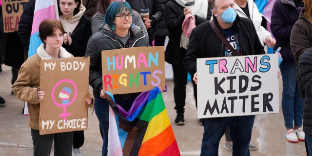 People gather in support of transgender youth during a rally at the Utah state Capitol, Jan. 24, 2023, in Salt Lake City.