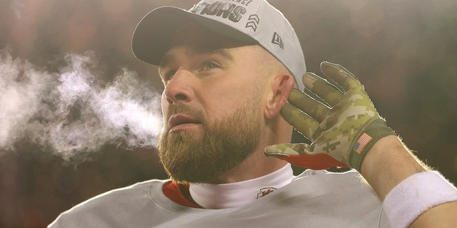 The Chiefs' Travis Kelce celebrates after defeating the Cincinnati Bengals 23-20 in the AFC Championship Game on January 29, 2023 in Kansas City.