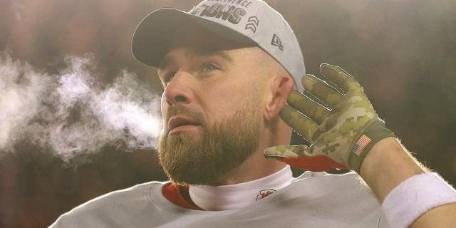 The Chiefs' Travis Kelce celebrates after defeating the Cincinnati Bengals 23-20 in the AFC Championship Game on January 29, 2023 in Kansas City.