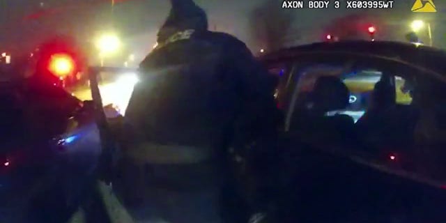 Multiple Memphis police officer attempt to remove Tyre Nichols from his vehicle on Jan. 7, 2023.