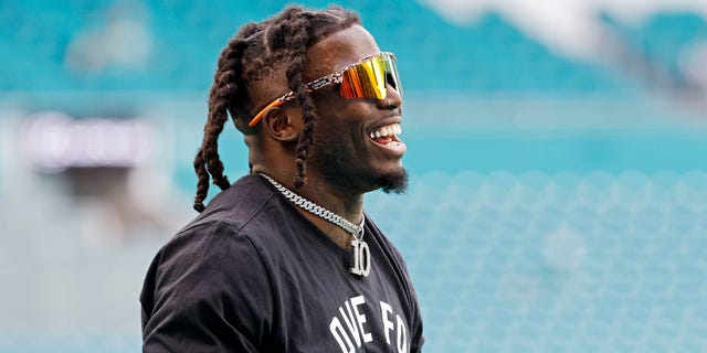 Tyreek Hill of the Dolphins warms up before the New York Jets game while wearing a shirt in support of Buffalo Bills safety Damar Hamlin at Hard Rock Stadium on Jan. 8, 2023, in Miami Gardens, Florida.