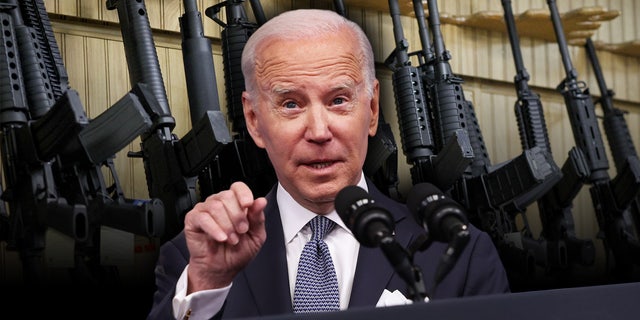 Joe Biden in front of rifles pointing