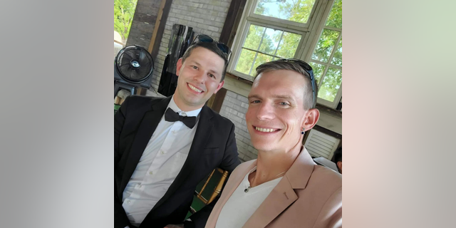 Zachary Zulock and William Zulock at a wedding.