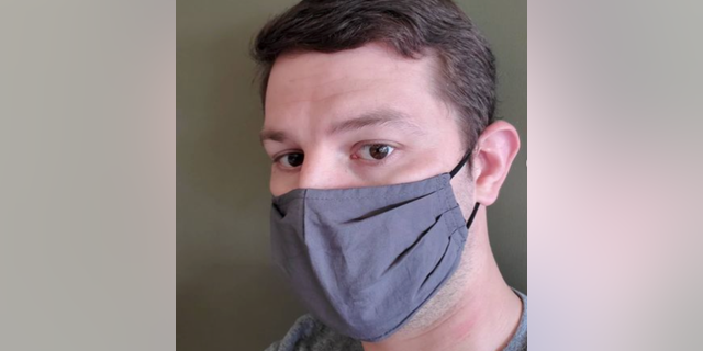 Zachary Zulock wearing a mask.