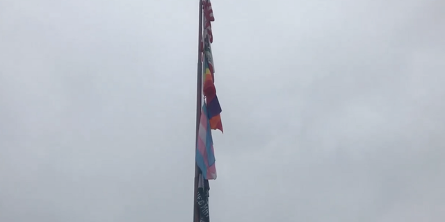 FILE- In June 2020, the district flew flags representing Black Lives Matter, pride, and transgender rights movements.