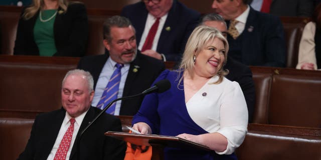 Rep.-elect Kat Cammack speaks alongside Rep.-elect Steve Scalise in the House Chamber during the elections for speaker of the House at the U.S. Capitol on Jan. 4, 2023.