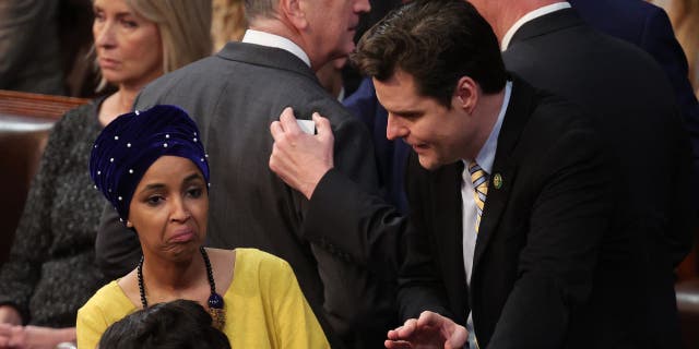 U.S. Rep. Matt Gaetz (R-FL) (R) talks to Squad member Rep. Ilhan Omar (D-MN) in the House Chamber during the third day of elections for Speaker of the House at the U.S. Capitol Building on January 05, 2023 in Washington, DC.