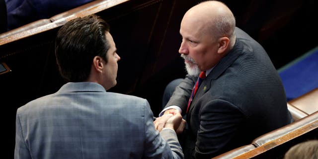 Congressman-elect Matt Gaetz, R-Fla., speaks with Congressman-elect Chip Roy, R-Texas, in the House chamber during the fourth day of elections for speaker of the House.