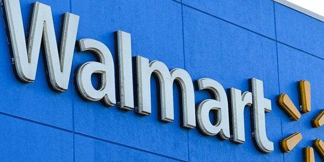 A Walmart logo outside a Walmart store in Burbank, California on August 15, 2022. 