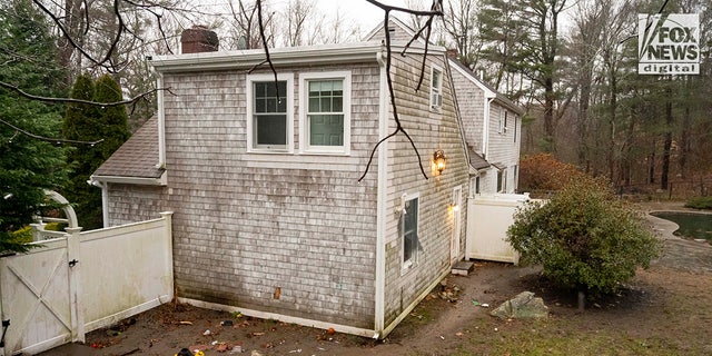 The rear of the home in Cohasset, Mass., owned by Ana Walshe Friday, Jan. 6, 2023. Walshe has been reported missing and was last seen New Year's Day.