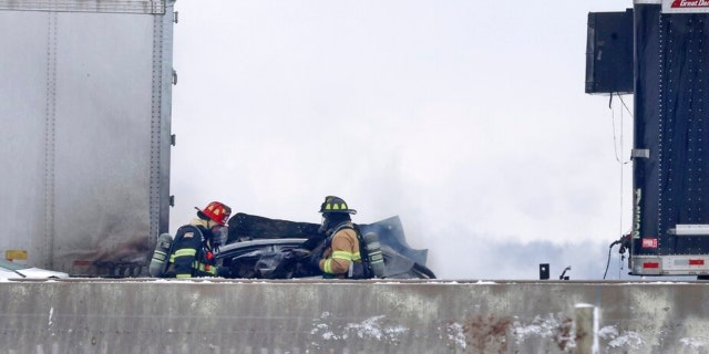 Emergency crews respond to a multi-vehicle crash on both the northbound and southbound lanes of Interstate 39/90 north of the East Creek Road overpass on January 27, 2023 in Turtle, Wisconsin.