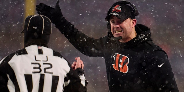 Cincinnati Bengals head coach Zac Taylor speaks to a referee during a Buffalo Bills game at Highmark Stadium on January 22, 2023.