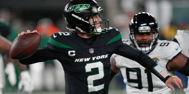 New York Jets quarterback Zach Wilson passes against the Jacksonville Jaguars, on December 22, 2022, in East Rutherford, New Jersey.