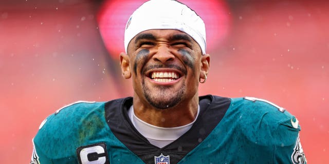 Philadelphia Eagles quarterback Jalen Hurts #1 celebrates after defeating the Washington Commanders at FedExField on September 25, 2022 in Landover, Maryland.