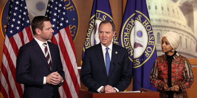 Rep. Adam Schiff, D-Calif., flanked by Rep. Eric Swalwell, D-Calif., and Rep. Ilhan Omar, D-Minn., speaks at a press conference on committee assignments for the 118th U.S. Congress at the U.S. Capitol Building in Washington, D.C., on Wednesday.
