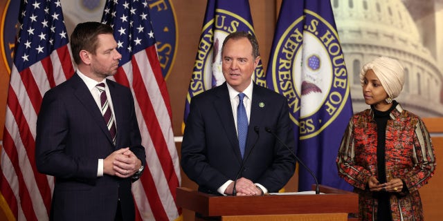 Rep. Adam Schiff, D-Calif., flanked by Rep. Eric Swalwell, D-Calif., and Rep. Ilhan Omar, D-Minn., speaks at a press conference on committee assignments for the 118th U.S. Congress at the U.S. Capitol Building in Washington, D.C., on Wednesday.