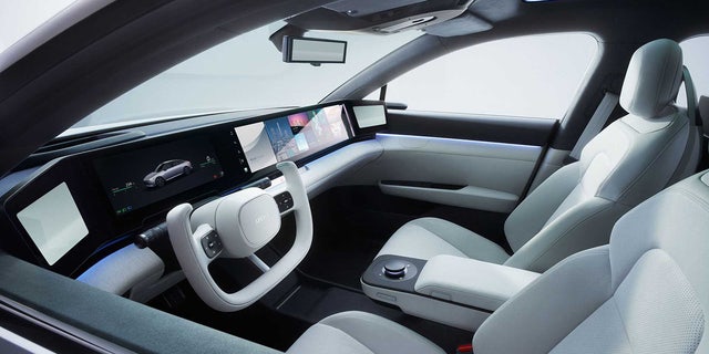 The Afeela's interior has a widescreen digital display and video sideview mirrors.