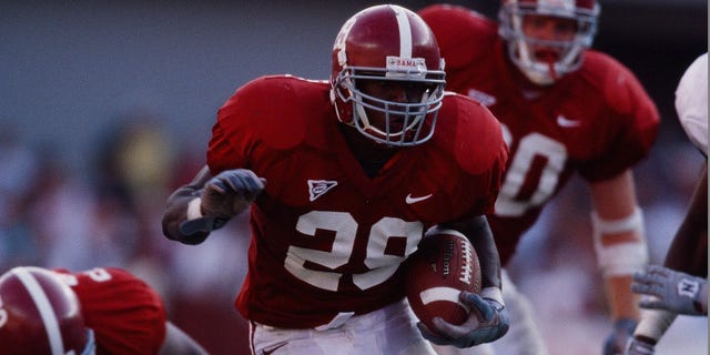 Ahmaad Galloway of the Alabama Crimson Tide runs with the ball against the South Carolina Gamecocks Sept. 30, 2000.