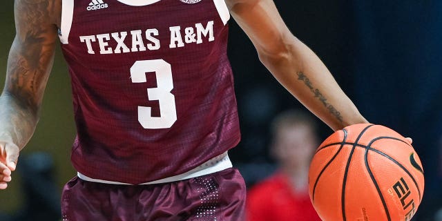 Texas AM guard Quenton Jackson moves the ball against Ole Miss on February 26, 2022 at SJB Pavilion in Oxford, Mississippi.