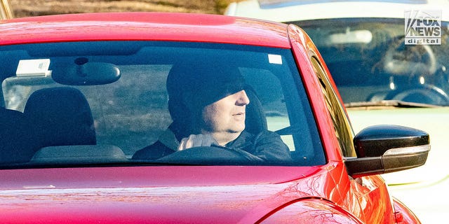 A view of who appears to be Brian Walshe driving away from the Walshe home in Cohasset, Massachusetts.