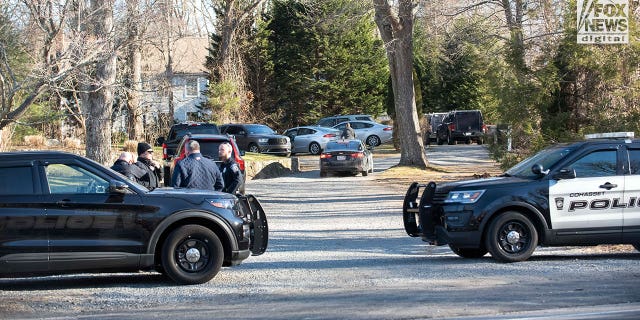 Law enforcement and investigators returned to the Walshe home in Cohasset, Mass. Law enforcement appeared to have moved the family out of the house to investigate its contents.