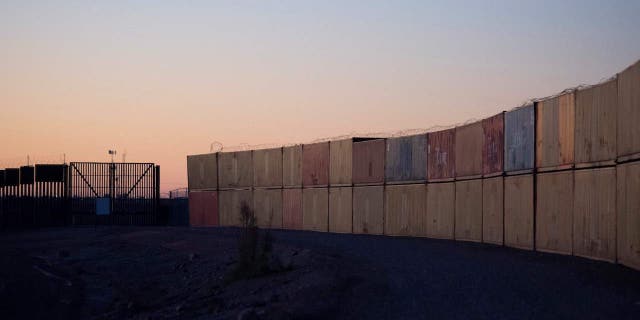 Arizona began removing the shipping containers used to plug gaps in the border wall.