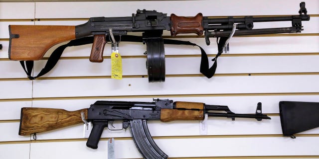 FILE - Assault weapons are seen for sale at Capitol City Arms Supply on Jan. 16, 2013, in Springfield, Illinois.