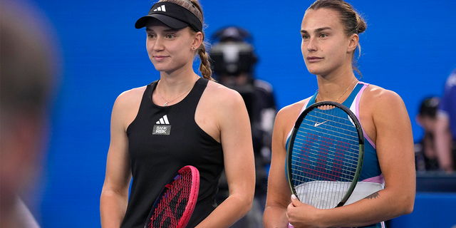 Elena Rybakina, left, and Aryna Sabalenka, pose for a photo before the women's singles final at the Australian Open tennis championships.