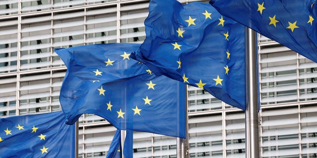 European Union flags flutter outside the EU Commission headquarters in Brussels, Belgium, on Sept 28, 2022.