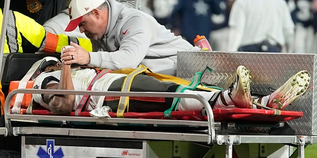 Buccaneers wide receiver Russell Gage is taken off the field, Monday, Jan. 16, 2023, in Tampa.