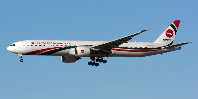 Biman Bangladesh Airlines Boeing 777-300ER landing at London Heathrow Airport.