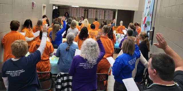 Inmates participate in a faith-based rehabilitation group at Decatur County Jail.