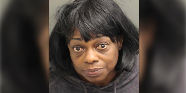 Angila Baxter, 56, is charged in the shooting death of Nekaybaw Collier, 27.