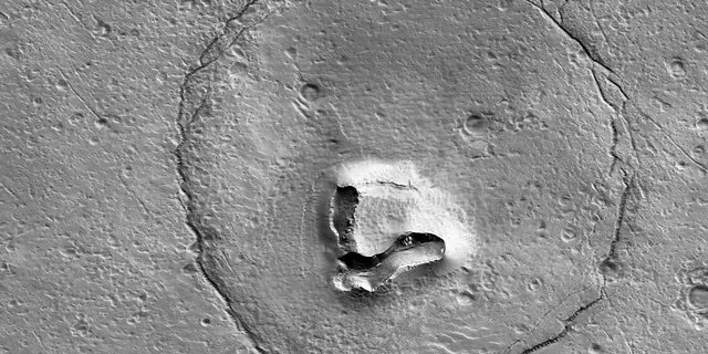 The University of Arizona released this photo of a formation on the surface of Mars that resembles a bear's face. 