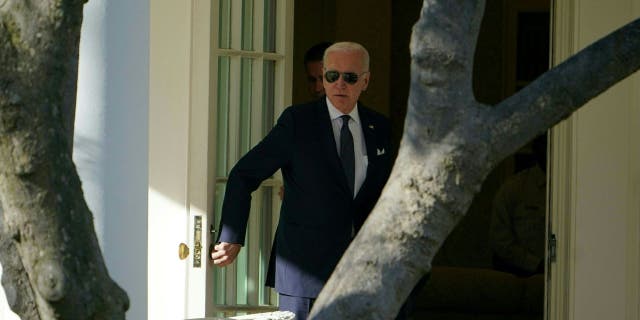 President Joe Biden walks to the Oval Office of the White House on Jan. 16, 2023.