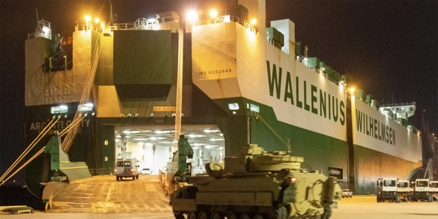 Bradley fighting vehicles being loaded on to the ARC Integrity at the Transportation Core Dock in North Charleston, South Carolina.