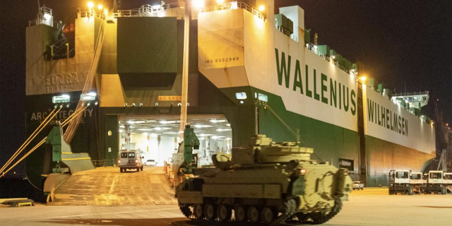 Bradley fighting vehicles being loaded on to the ARC Integrity at the Transportation Core Dock in North Charleston, South Carolina.